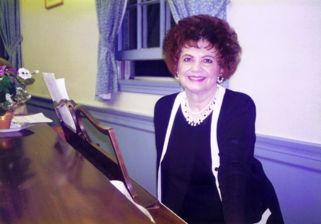 Joan Hartz at the piano
